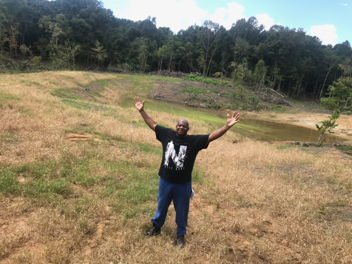 Yayyy, Mother Nature is slowly but surely filling up our 1.3 acre pond!  (Gregory Foster at the pond, October 06, 2018)